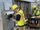 Two system analysts review networking equipment.