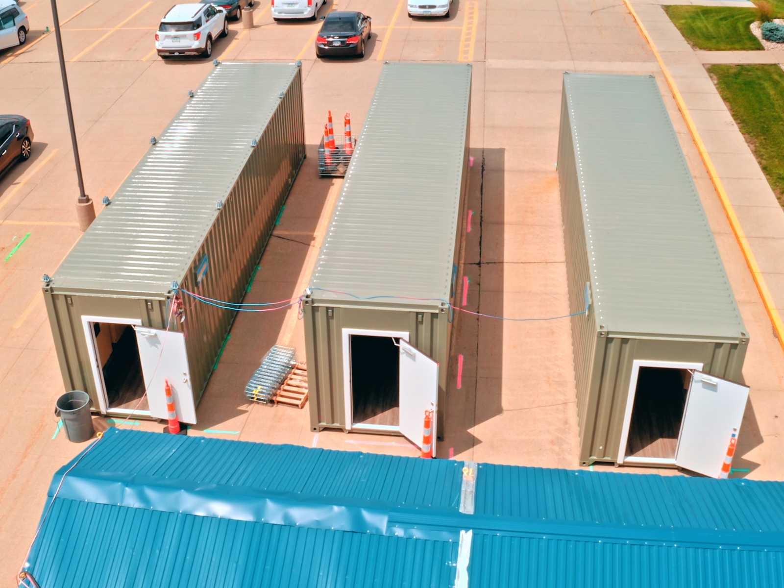 Aerial view of three e-houses.