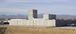 outside view of a pet care facility with mountains in the background