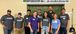 Interstates team members smiling while volunteering at a food bank.