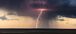 A storm with a lightning bolt striking.