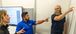 Three Interstates team member pointing to a whiteboard.
