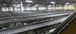 Conveyer belts inside of a distribution facility warehouse.