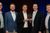 Group of 5 Interstates team members in sports jackets smiling at the camera holding Control System Integrator Association's 2026 Integrator Member of the Year Award