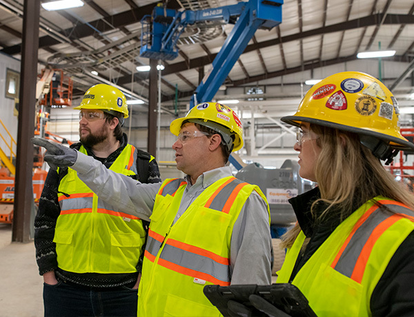 Three experts conduct an audit.