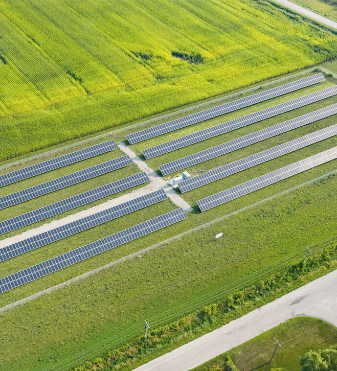 Aerial view of solar panels in a field.