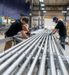 Interstates employees fabricating conduit for a manufactured solution.