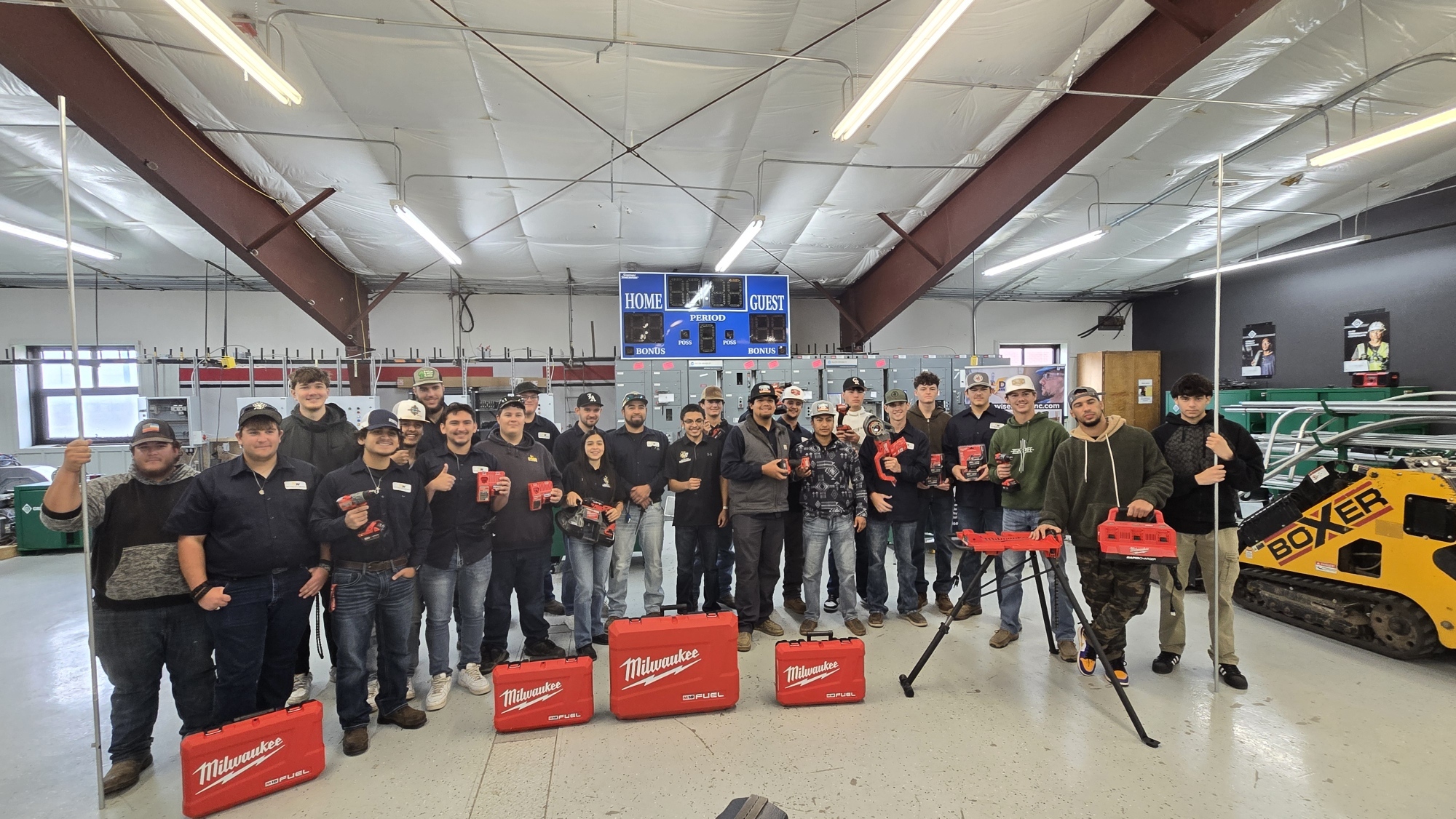 group of students with Milwaukee tools in front of them